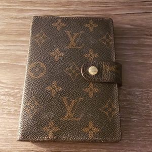 Louis vuitton wallet slash address book.
